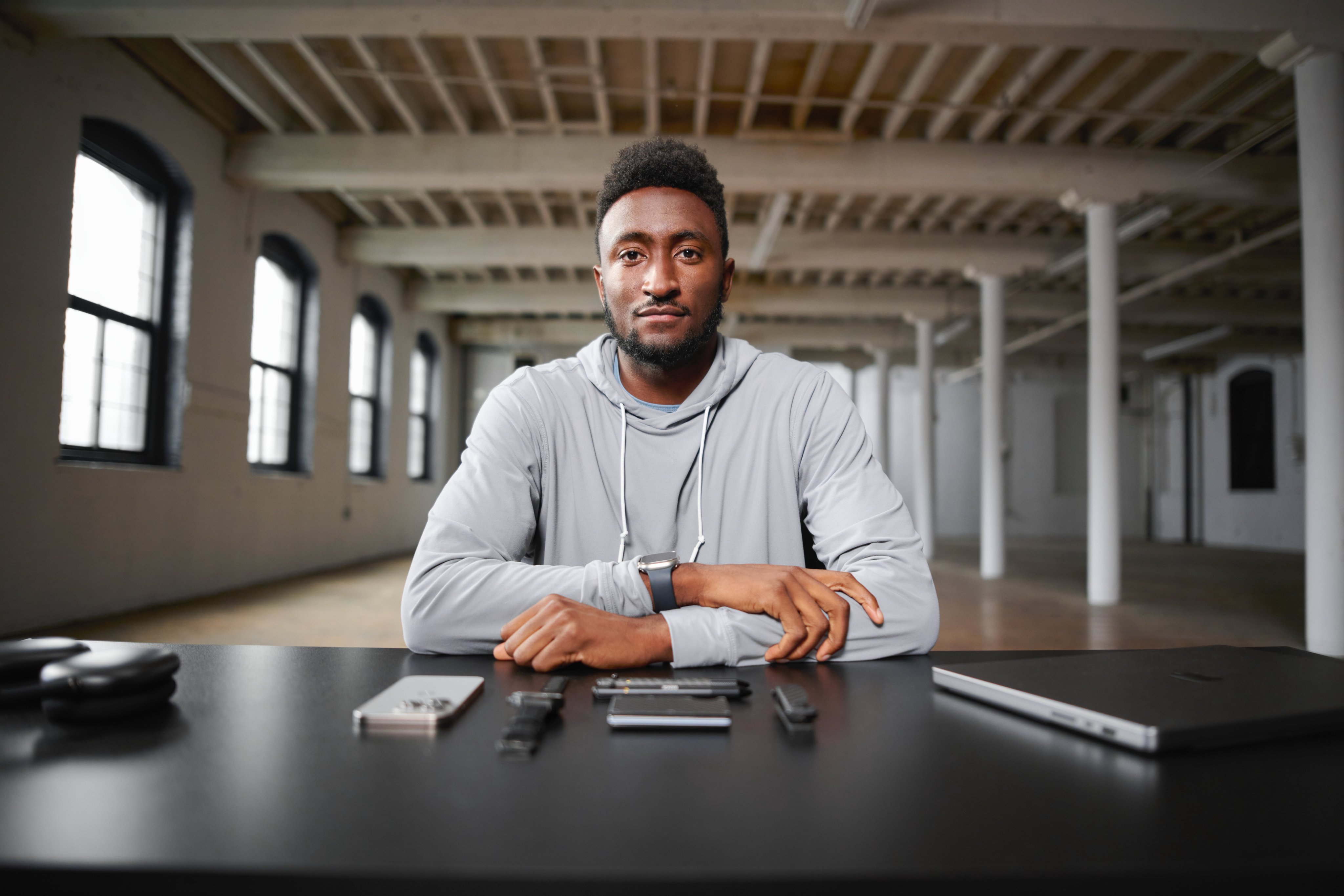 Marques Brownlee sitting at desk
