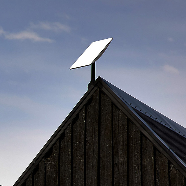 SpaceX Starlink satellite dish on roof.